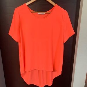 Lush High-Low Neon Orange Short Sleeve Top